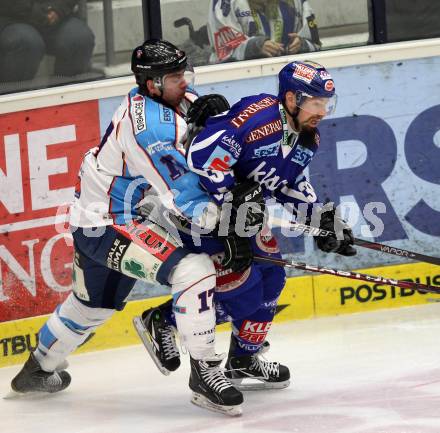 EBEL. Eishockey Bundesliga. EC Rekord Fenster VSV gegen SAPA Fehervar AV19. Markus Peintner, (VSV),  Balazs Lada (Alba Volan). Villach, am 1.1.2012.
Foto: Kuess 


---
pressefotos, pressefotografie, kuess, qs, qspictures, sport, bild, bilder, bilddatenbank