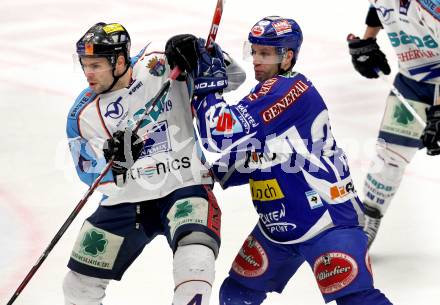 EBEL. Eishockey Bundesliga. EC Rekord Fenster VSV gegen SAPA Fehervar AV19. Greg Kuznik,  (VSV), Andras Horvath (Alba Volan). Villach, am 1.1.2012.
Foto: Kuess 


---
pressefotos, pressefotografie, kuess, qs, qspictures, sport, bild, bilder, bilddatenbank