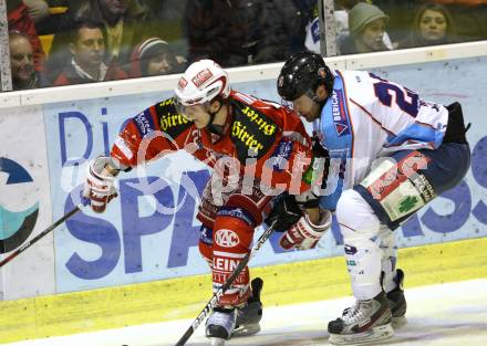 EBEL. Eishockey Bundesliga. KAC gegen SAPA Fehervar AV19. GEIER Manuel (KAC), MIHALY Arpad (Alba Volan). Klagenfurt, am 3.1.2012.
Foto: Kuess

---
pressefotos, pressefotografie, kuess, qs, qspictures, sport, bild, bilder, bilddatenbank