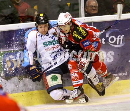 EBEL. Eishockey Bundesliga. KAC gegen SAPA Fehervar AV19. HERBURGER Raphael (KAC), SILLE Tamas (Alba Volan). Klagenfurt, am 3.1.2012.
Foto: Kuess

---
pressefotos, pressefotografie, kuess, qs, qspictures, sport, bild, bilder, bilddatenbank