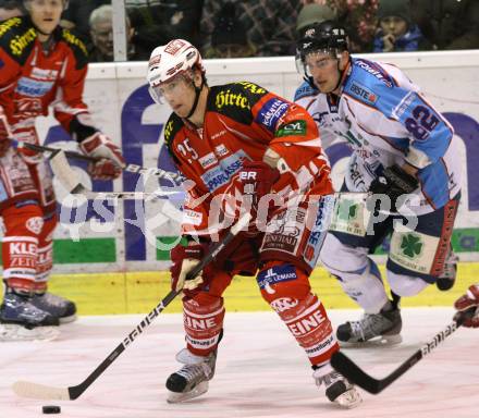 EBEL. Eishockey Bundesliga. KAC gegen SAPA Fehervar AV19. FUREY Kirk (KAC), MAGOSI Balint (Alba Volan). Klagenfurt, am 3.1.2012.
Foto: Kuess

---
pressefotos, pressefotografie, kuess, qs, qspictures, sport, bild, bilder, bilddatenbank