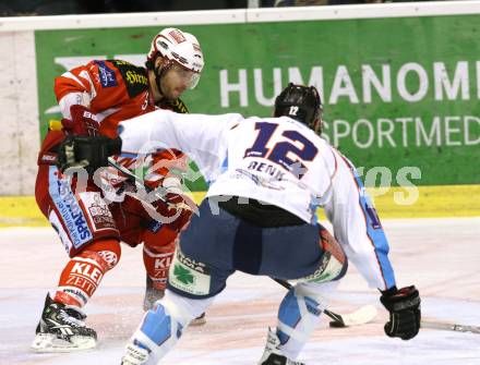EBEL. Eishockey Bundesliga. KAC gegen SAPA Fehervar AV19. TENUTE Joseph (KAC), BENK Andras (Alba Volan). Klagenfurt, am 3.1.2012.
Foto: Kuess

---
pressefotos, pressefotografie, kuess, qs, qspictures, sport, bild, bilder, bilddatenbank