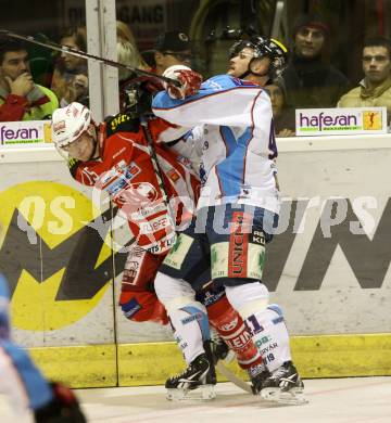 EBEL. Eishockey Bundesliga. KAC gegen SAPA Fehervar AV19. SCHELLANDER Paul (KAC), PRATT Harlan (Alba Volan). Klagenfurt, am 3.1.2012.
Foto: Kuess

---
pressefotos, pressefotografie, kuess, qs, qspictures, sport, bild, bilder, bilddatenbank