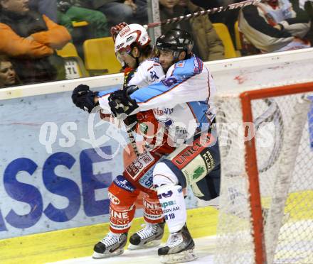 EBEL. Eishockey Bundesliga. KAC gegen SAPA Fehervar AV19. HERBURGER Raphael (KAC), DACOSTA Justin (Alba Volan). Klagenfurt, am 3.1.2012.
Foto: Kuess

---
pressefotos, pressefotografie, kuess, qs, qspictures, sport, bild, bilder, bilddatenbank