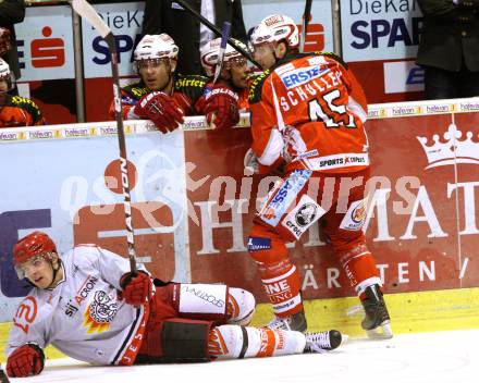 EBEL. Eishockey Bundesliga. KAC gegen HK Acroni Jesenice. SCHULLER David (KAC), ERMAN Matevz (Jesenice). Klagenfurt, am 6.1.2012.
Foto: Kuess

---
pressefotos, pressefotografie, kuess, qs, qspictures, sport, bild, bilder, bilddatenbank