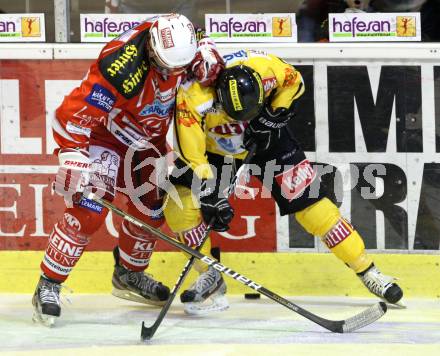 EBEL. Eishockey Bundesliga. KAC gegen UPC VIENNA CAPITALS. REICHEL Johannes (KAC), SEIDL Mario (Caps). Klagenfurt, am 10.1.2012.
Foto: Kuess

---
pressefotos, pressefotografie, kuess, qs, qspictures, sport, bild, bilder, bilddatenbank