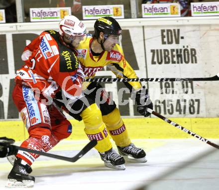 EBEL. Eishockey Bundesliga. KAC gegen UPC VIENNA CAPITALS. RATZ Herbert (KAC), FERLAND Jonathan (Caps). Klagenfurt, am 10.1.2012.
Foto: Kuess

---
pressefotos, pressefotografie, kuess, qs, qspictures, sport, bild, bilder, bilddatenbank