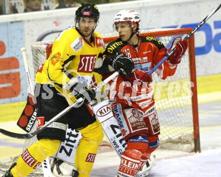 EBEL. Eishockey Bundesliga. KAC gegen UPC VIENNA CAPITALS. KOCH Thomas (KAC), LAKOS Philippe (Caps). Klagenfurt, am 10.1.2012.
Foto: Kuess

---
pressefotos, pressefotografie, kuess, qs, qspictures, sport, bild, bilder, bilddatenbank