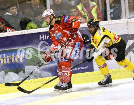 EBEL. Eishockey Bundesliga. KAC gegen UPC VIENNA CAPITALS. KIRISITS Johannes (KAC), ROBINSON Nathan (Caps). Klagenfurt, am 10.1.2012.
Foto: Kuess

---
pressefotos, pressefotografie, kuess, qs, qspictures, sport, bild, bilder, bilddatenbank