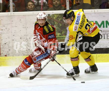 EBEL. Eishockey Bundesliga. KAC gegen UPC VIENNA CAPITALS. SCHULLER David (KAC), CASPARSSON Peter (Caps). Klagenfurt, am 10.1.2012.
Foto: Kuess

---
pressefotos, pressefotografie, kuess, qs, qspictures, sport, bild, bilder, bilddatenbank