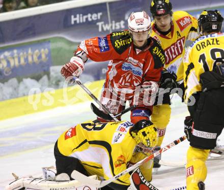 EBEL. Eishockey Bundesliga. KAC gegen UPC VIENNA CAPITALS. GEIER Manuel (KAC), DIVIS Reinhard, RODMAN Marcel (Caps). Klagenfurt, am 10.1.2012.
Foto: Kuess

---
pressefotos, pressefotografie, kuess, qs, qspictures, sport, bild, bilder, bilddatenbank