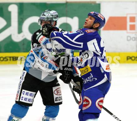 EBEL. Eishockey Bundesliga. EC Rekord Fenster VSV gegen EHC LIWEST BLACK WINGS LINZ. CRAIG Michael (VSV), VEIDEMAN Adrian (Linz). Villach, am 13.1.2012.
Foto: Kuess 


---
pressefotos, pressefotografie, kuess, qs, qspictures, sport, bild, bilder, bilddatenbank