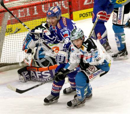 EBEL. Eishockey Bundesliga. EC Rekord Fenster VSV gegen EHC LIWEST BLACK WINGS LINZ. TOPOROWSKI Shayne (VSV), IRMEN Danny (Linz). Villach, am 13.1.2012.
Foto: Kuess 


---
pressefotos, pressefotografie, kuess, qs, qspictures, sport, bild, bilder, bilddatenbank