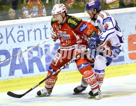 EBEL. Eishockey Bundesliga. KAC gegen VSV. SCHULLER David (KAC), PETRIK Benjamin (VSV). Klagenfurt, am 17.1.2012.
Foto: Kuess

---
pressefotos, pressefotografie, kuess, qs, qspictures, sport, bild, bilder, bilddatenbank