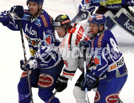 EBEL. Eishockey Bundesliga. EC Rekord Fenster VSV gegen HC Orli Znojmo.  Mario Altmann, Roland Kaspitz (VSV),  David Bartos (Znaim). Villach, am 20.1.2012.
Foto: Kuess 


---
pressefotos, pressefotografie, kuess, qs, qspictures, sport, bild, bilder, bilddatenbank
