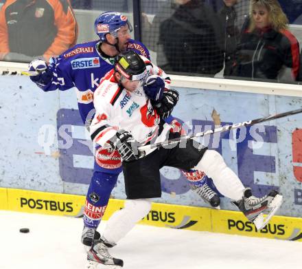 EBEL. Eishockey Bundesliga. EC Rekord Fenster VSV gegen HC Orli Znojmo.  Tomaz Razingar (VSV),  Jan Lattner (Znaim). Villach, am 20.1.2012.
Foto: Kuess 


---
pressefotos, pressefotografie, kuess, qs, qspictures, sport, bild, bilder, bilddatenbank