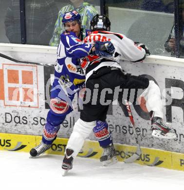 EBEL. Eishockey Bundesliga. EC Rekord Fenster VSV gegen HC Orli Znojmo.  Greg Kuznik (VSV),  Michael Danton (Znaim). Villach, am 20.1.2012.
Foto: Kuess 


---
pressefotos, pressefotografie, kuess, qs, qspictures, sport, bild, bilder, bilddatenbank