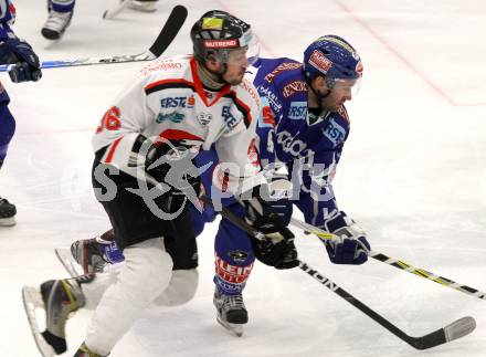 EBEL. Eishockey Bundesliga. EC Rekord Fenster VSV gegen HC Orli Znojmo.  Tomaz Razingar (VSV), Richard Jarusek (Znaim). Villach, am 20.1.2012.
Foto: Kuess 


---
pressefotos, pressefotografie, kuess, qs, qspictures, sport, bild, bilder, bilddatenbank