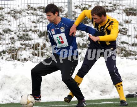 Fussball Testspiel. WAC/St. Andrae gegen VSV. Mihret Topcagic (WAC), Udo Gasser (VSV). St. Andrae, am 21.1.2012.
Foto: Kuess
---
pressefotos, pressefotografie, kuess, qs, qspictures, sport, bild, bilder, bilddatenbank