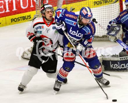 EBEL. Eishockey Bundesliga. EC Rekord Fenster VSV gegen HC Orli Znojmo.  UNTERLUGGAUER Gerhard (VSV), PODESVA Martin (Znaim). Villach, am 22.1.2012.
Foto: Kuess 


---
pressefotos, pressefotografie, kuess, qs, qspictures, sport, bild, bilder, bilddatenbank