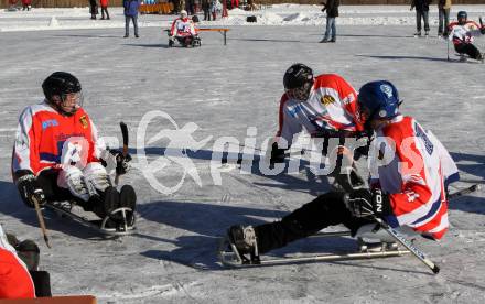 Behindertensport. Sledgehockey. Vergleichskampf Kaernten gegen St. Poelten. Rauschele See, am 21.1.2012.
Foto: Kuess
---
pressefotos, pressefotografie, kuess, qs, qspictures, sport, bild, bilder, bilddatenbank