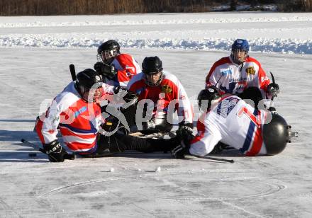 Behindertensport. Sledgehockey. Vergleichskampf Kaernten gegen St. Poelten. Rauschele See, am 21.1.2012.
Foto: Kuess
---
pressefotos, pressefotografie, kuess, qs, qspictures, sport, bild, bilder, bilddatenbank