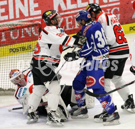 EBEL. Eishockey Bundesliga. EC Rekord Fenster VSV gegen HC Orli Znojmo.  PEWAL Marco, (VSV),  STACH Lubomir, HAJEK David, KACETL Ondrej (Znaim). Villach, am 22.1.2012.
Foto: Kuess 


---
pressefotos, pressefotografie, kuess, qs, qspictures, sport, bild, bilder, bilddatenbank