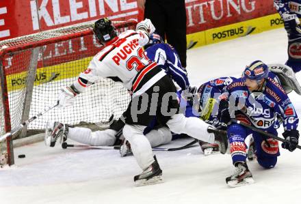 EBEL. Eishockey Bundesliga. EC Rekord Fenster VSV gegen HC Orli Znojmo.  DAMON Derek (VSV), PUCHER Peter (Znaim). Villach, am 22.1.2012.
Foto: Kuess 


---
pressefotos, pressefotografie, kuess, qs, qspictures, sport, bild, bilder, bilddatenbank