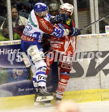 EBEL. Eishockey Bundesliga. KAC gegen Medvescak Zagreb. Thomas Koch (KAC), Sasa Martinovic  (Zagreb). Klagenfurt, am 24.1.2012.
Foto: Kuess

---
pressefotos, pressefotografie, kuess, qs, qspictures, sport, bild, bilder, bilddatenbank