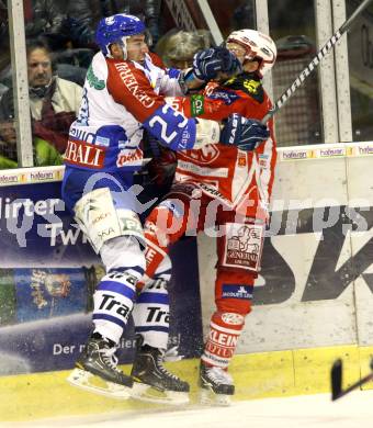 EBEL. Eishockey Bundesliga. KAC gegen Medvescak Zagreb. Thomas Koch (KAC), Sasa Martinovic (Zagreb). Klagenfurt, am 24.1.2012.
Foto: Kuess

---
pressefotos, pressefotografie, kuess, qs, qspictures, sport, bild, bilder, bilddatenbank