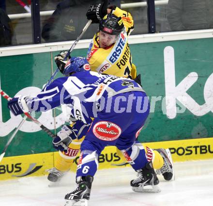 EBEL. Eishockey Bundesliga. EC Rekord Fenster VSV gegen UPC Vienna Capitals. Gerhard Unterluggauer,  (VSV), Francois Fortier (Caps). Villach, am 27.1.2012.
Foto: Kuess 


---
pressefotos, pressefotografie, kuess, qs, qspictures, sport, bild, bilder, bilddatenbank