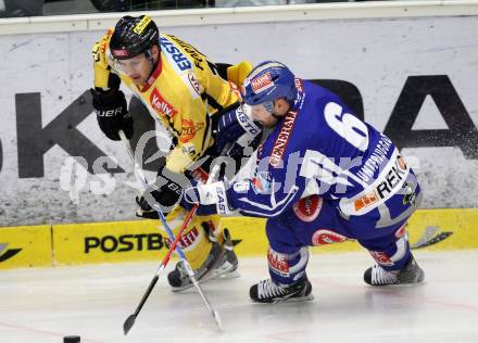 EBEL. Eishockey Bundesliga. EC Rekord Fenster VSV gegen UPC Vienna Capitals. Gerhard Unterluggauer,  (VSV), Francois Fortier (Caps). Villach, am 27.1.2012.
Foto: Kuess 


---
pressefotos, pressefotografie, kuess, qs, qspictures, sport, bild, bilder, bilddatenbank