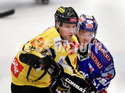 EBEL. Eishockey Bundesliga. EC Rekord Fenster VSV gegen UPC Vienna Capitals. Marco Pewal,  (VSV), Benoit Gratton (Caps). Villach, am 27.1.2012.
Foto: Kuess 


---
pressefotos, pressefotografie, kuess, qs, qspictures, sport, bild, bilder, bilddatenbank