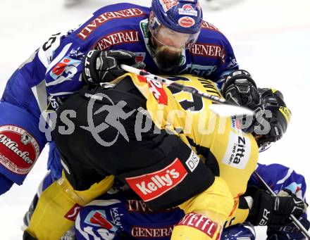 EBEL. Eishockey Bundesliga. EC Rekord Fenster VSV gegen UPC Vienna Capitals. Markus Peintner, (VSV), Philipp Pinter  (Caps). Villach, am 27.1.2012.
Foto: Kuess 


---
pressefotos, pressefotografie, kuess, qs, qspictures, sport, bild, bilder, bilddatenbank