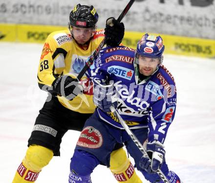 EBEL. Eishockey Bundesliga. EC Rekord Fenster VSV gegen UPC Vienna Capitals. Kevin Mitchell,  (VSV), Filip Gunnarsson (Caps). Villach, am 27.1.2012.
Foto: Kuess 


---
pressefotos, pressefotografie, kuess, qs, qspictures, sport, bild, bilder, bilddatenbank