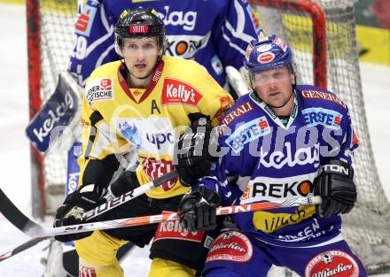 EBEL. Eishockey Bundesliga. EC Rekord Fenster VSV gegen UPC Vienna Capitals. Robert Shearer,  (VSV), Philipp Pinter (Caps). Villach, am 27.1.2012.
Foto: Kuess 


---
pressefotos, pressefotografie, kuess, qs, qspictures, sport, bild, bilder, bilddatenbank