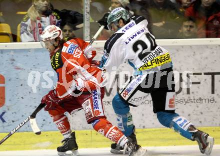 EBEL. Eishockey Bundesliga. KAC gegen EHC LIWEST Linz. Tyler Scofield, (KAC), Adrian Veideman (Linz). Klagenfurt, am 29.1.2012.
Foto: Kuess

---
pressefotos, pressefotografie, kuess, qs, qspictures, sport, bild, bilder, bilddatenbank