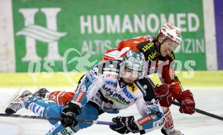 EBEL. Eishockey Bundesliga. KAC gegen EHC LIWEST Linz. Tyler Scofield,,  (KAC), Danny Irmen (Linz). Klagenfurt, am 29.1.2012.
Foto: Kuess

---
pressefotos, pressefotografie, kuess, qs, qspictures, sport, bild, bilder, bilddatenbank