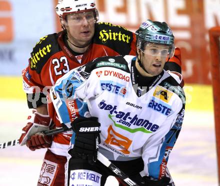 EBEL. Eishockey Bundesliga. KAC gegen EHC LIWEST Linz. Mike Siklenka, (KAC), Gregor Baumgartner (Linz). Klagenfurt, am 29.1.2012.
Foto: Kuess

---
pressefotos, pressefotografie, kuess, qs, qspictures, sport, bild, bilder, bilddatenbank