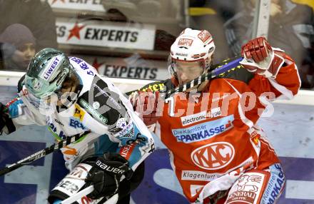 EBEL. Eishockey Bundesliga. KAC gegen EHC LIWEST Linz. Herbert Ratz, (KAC), Martin Mairitsch (Linz). Klagenfurt, am 29.1.2012.
Foto: Kuess

---
pressefotos, pressefotografie, kuess, qs, qspictures, sport, bild, bilder, bilddatenbank