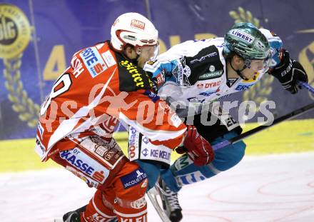 EBEL. Eishockey Bundesliga. KAC gegen EHC LIWEST Linz. Thomas Koch,  (KAC), Danny Irmen (Linz). Klagenfurt, am 29.1.2012.
Foto: Kuess

---
pressefotos, pressefotografie, kuess, qs, qspictures, sport, bild, bilder, bilddatenbank