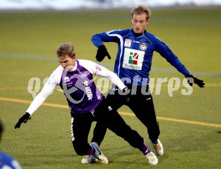 Fussball Testspiel. SK Austria Klagenfurt gegen WAC/St. Andrae.  Peter Pucker, (Klagenfurt), Danijel Micic (WAC). Poggersdorf, am 1.2.2012.
Foto: Kuess
---
pressefotos, pressefotografie, kuess, qs, qspictures, sport, bild, bilder, bilddatenbank