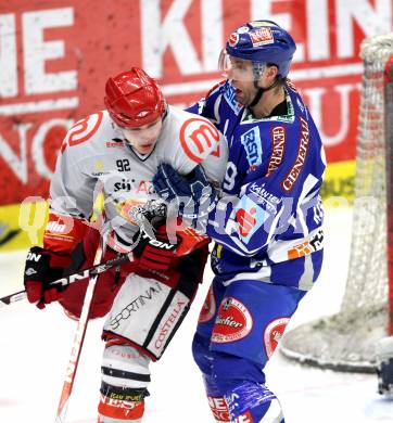EBEL. Eishockey Bundesliga. EC Rekord Fenster VSV gegen HK Acroni Jesenice. Greg Kuznik,  (VSV),  Anze Kuralt (Jesenice). Villach, am 3.2.2012.
Foto: Kuess 


---
pressefotos, pressefotografie, kuess, qs, qspictures, sport, bild, bilder, bilddatenbank