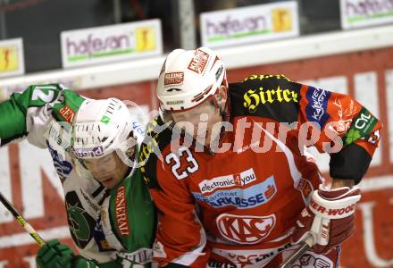 EBEL. Eishockey Bundesliga. KAC gegen HDD TILIA Olimpija Ljubljana. Mike Siklenka, (KAC), Petr Sachl (Laibach). Klagenfurt, am 12.2.2012.
Foto: Kuess

---
pressefotos, pressefotografie, kuess, qs, qspictures, sport, bild, bilder, bilddatenbank