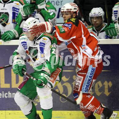 EBEL. Eishockey Bundesliga. KAC gegen HDD TILIA Olimpija Ljubljana. Stephan Geier, (KAC), Damjan Dervaric  (Laibach). Klagenfurt, am 12.2.2012.
Foto: Kuess

---
pressefotos, pressefotografie, kuess, qs, qspictures, sport, bild, bilder, bilddatenbank