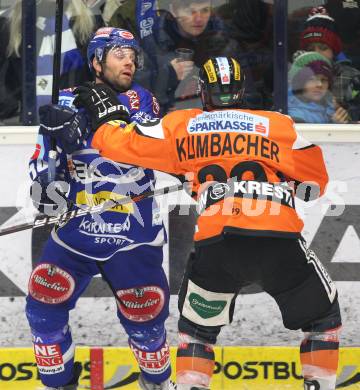 EBEL. Eishockey Bundesliga. EC Rekord Fenster VSV gegen Graz 99ers.  Derek Damon (VSV),  Sven Klimbacher (Graz). Villach, am 14.2.2012.
Foto: Kuess 


---
pressefotos, pressefotografie, kuess, qs, qspictures, sport, bild, bilder, bilddatenbank