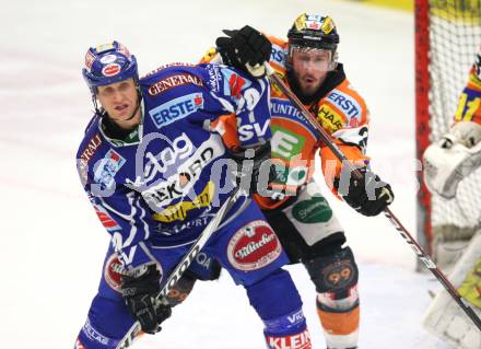 EBEL. Eishockey Bundesliga. EC Rekord Fenster VSV gegen Graz 99ers.  Mike Craig (VSV), Sven Klimbacher (Graz). Villach, am 14.2.2012.
Foto: Kuess 


---
pressefotos, pressefotografie, kuess, qs, qspictures, sport, bild, bilder, bilddatenbank