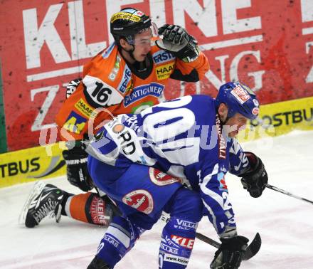 EBEL. Eishockey Bundesliga. EC Rekord Fenster VSV gegen Graz 99ers.  Mike Craig Patrick Harand (VSV),  (Graz). Villach, am 14.2.2012.
Foto: Kuess 


---
pressefotos, pressefotografie, kuess, qs, qspictures, sport, bild, bilder, bilddatenbank