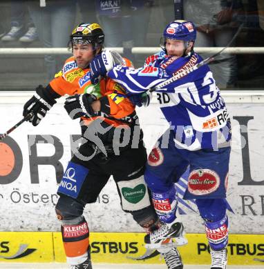 EBEL. Eishockey Bundesliga. EC Rekord Fenster VSV gegen Graz 99ers.  Andreas Wiedergut (VSV), Guillaume Lefebre (Graz). Villach, am 14.2.2012.
Foto: Kuess 


---
pressefotos, pressefotografie, kuess, qs, qspictures, sport, bild, bilder, bilddatenbank