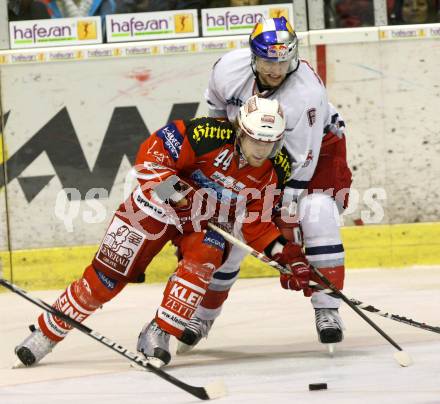 EBEL. Eishockey Bundesliga. KAC gegen EC Red Bull Salzburg. PIRMANN Markus (KAC), PALLESTRANG Alexander (Salzburg). Klagenfurt, am 26.2.2012.
Foto: Kuess

---
pressefotos, pressefotografie, kuess, qs, qspictures, sport, bild, bilder, bilddatenbank